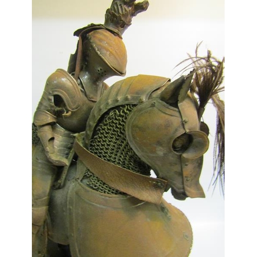 72 - A late 19c miniature Knight's armour for man and horse in 16c style, the horse of carved wood fitted... 