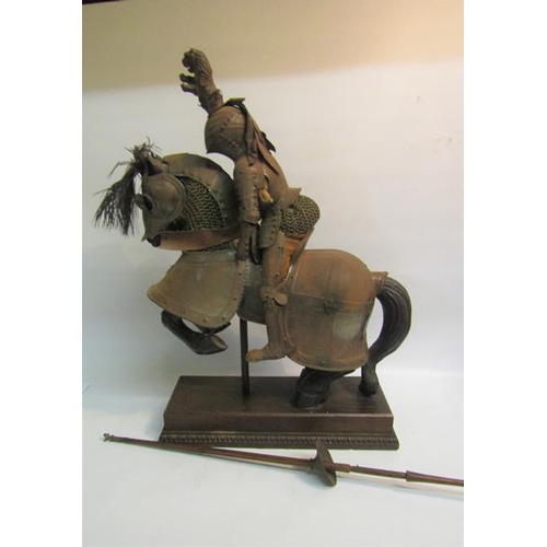 72 - A late 19c miniature Knight's armour for man and horse in 16c style, the horse of carved wood fitted... 