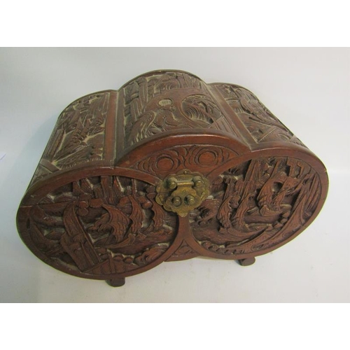 85 - A late 19/early 20c Oriental box of lobed form, panel carved with village and coastal scenes.  32cms... 