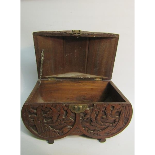 85 - A late 19/early 20c Oriental box of lobed form, panel carved with village and coastal scenes.  32cms... 