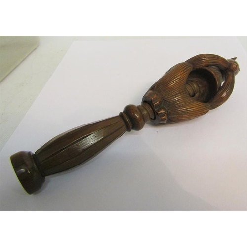 91 - A late 19/early 20c carved Sycamore Squirrel nutcrack, 18cms l.