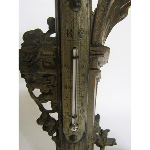 43 - A Victorian gilt spelter ink stand with thermometer in the form of a classical column amongst a ruin... 