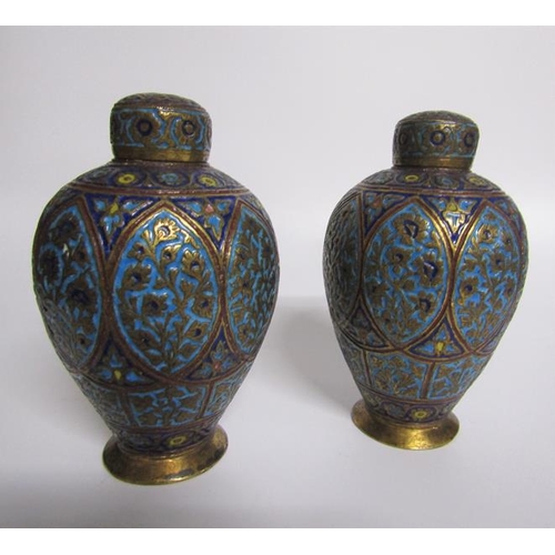 66 - A pair of 19c Indian brass and enamel tea canisters of baluster form decorated with ovoid panels of ... 