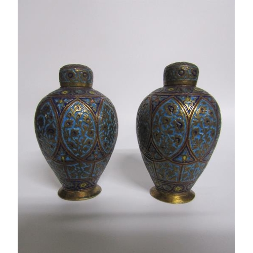 66 - A pair of 19c Indian brass and enamel tea canisters of baluster form decorated with ovoid panels of ... 