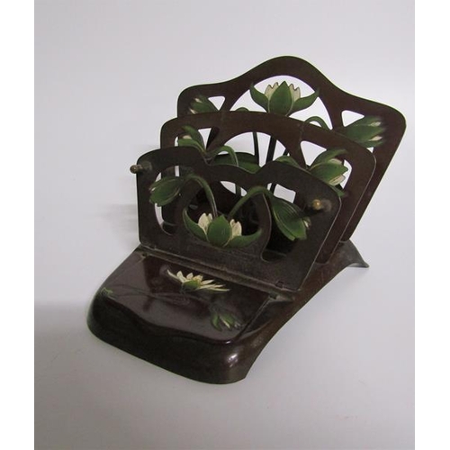 67 - An art nouveau letter stand stamped DJM 237670 E S. Gesch.  Bronze patinated, the three divisions fo... 