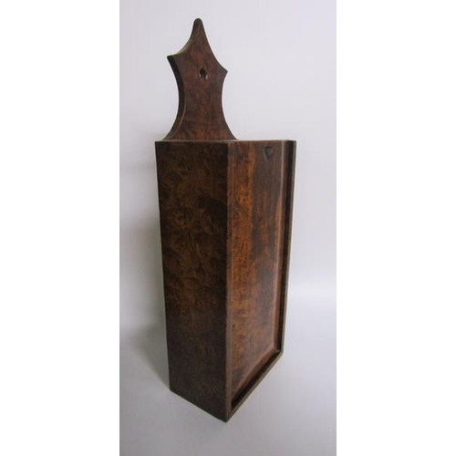 76 - A 19c burr wood wall hanging candle box with sliding cover.  16cms w 46cms h.