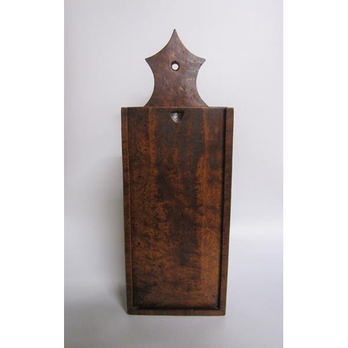 76 - A 19c burr wood wall hanging candle box with sliding cover.  16cms w 46cms h.