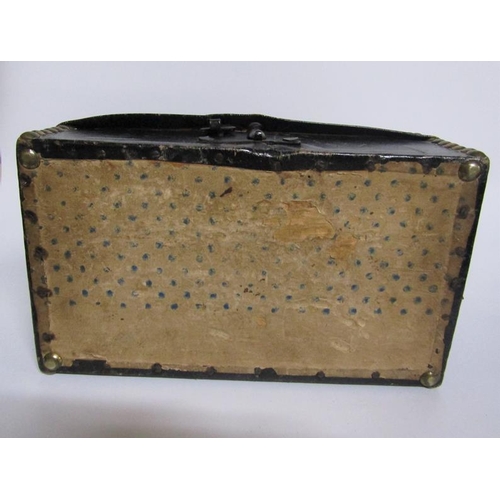 78 - A George III leather and brass studded small trunk, paper lined and with a label Charles M Domett.  ... 