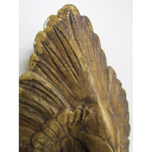 81 - A 19c carved wooden stucco gilded wall bracket supported by a swan with open wings.  37cms w x 47cms... 