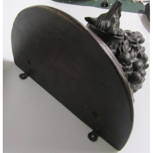 82 - A 19c Black Forest acorn and oak leaf carved wall bracket with a boars head mask.  28cm w x 39cm h.