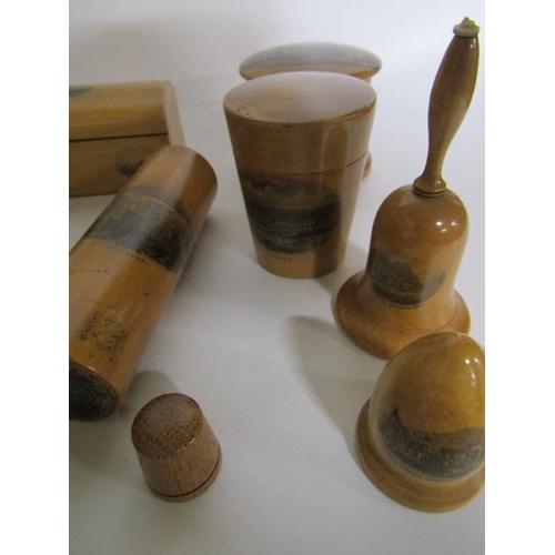 97 - A collection of seven mauchline ware boxes together with acorn thimble holder, a thimble and a powde... 