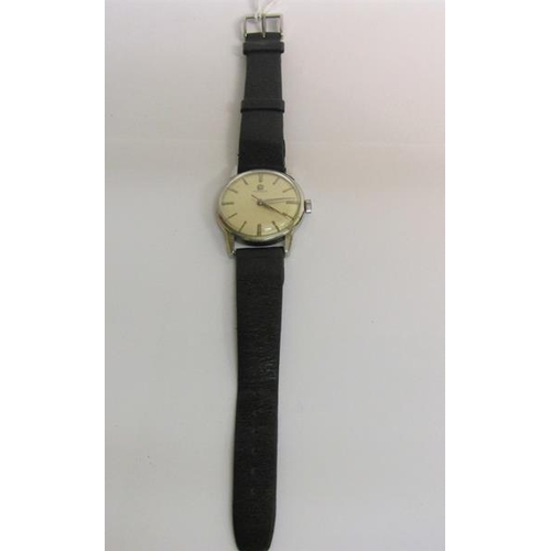 139 - A 1960 gents Omega wristwatch with mechanical movement.  The satin silver dial has bright silver bat... 