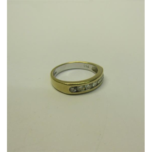 191 - An 18ct gold Diamond set half eternity ring - ring size P.