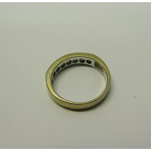 191 - An 18ct gold Diamond set half eternity ring - ring size P.