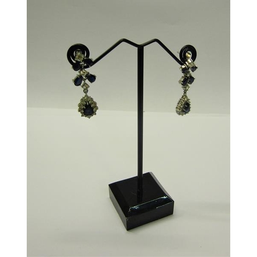 192 - A pair of Diamond and Sapphire set drop earrings