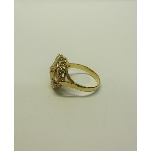 208 - A gold Diamond cluster ring - ring size O/P