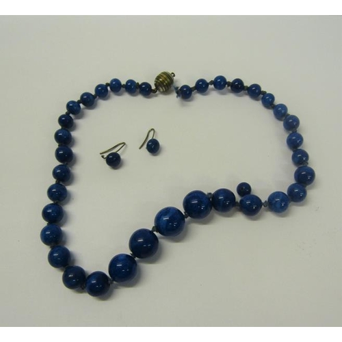 158 - A Lapis Lazuli graduated bead necklace together with pair of earrings. Necklace 36cms l.