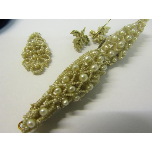 160 - A suite of Victorian seed pearl, comprising bar brooch, pair of earrings and a pendant.