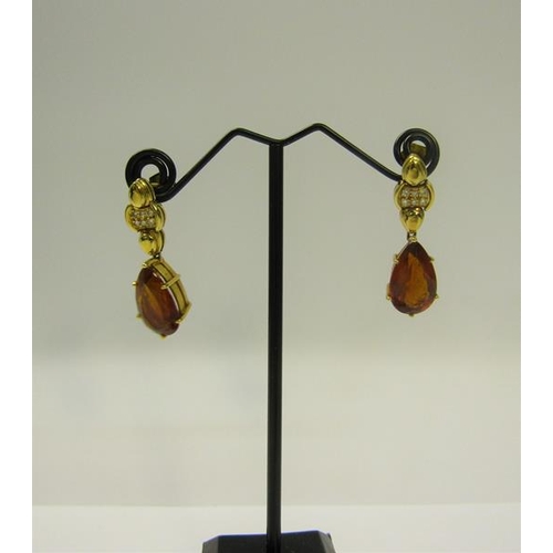 163 - A pair of 18ct gold Citrine and Diamond earrings