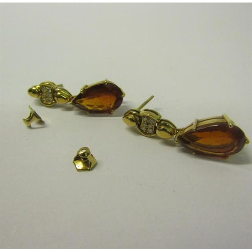 163 - A pair of 18ct gold Citrine and Diamond earrings