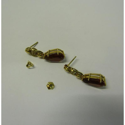 163 - A pair of 18ct gold Citrine and Diamond earrings