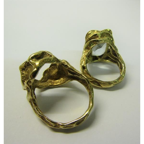 176 - Two 18ct gold rustic formed rings, one set with cut Aquamarine, the other empty.  Total weight 20.5g... 