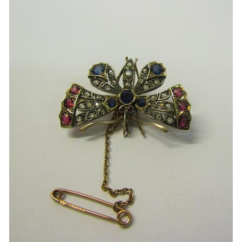 178 - A gold Butterfly brooch set with diamond, ruby, sapphire and pearls, with a safety chain.  Brooch 4.... 