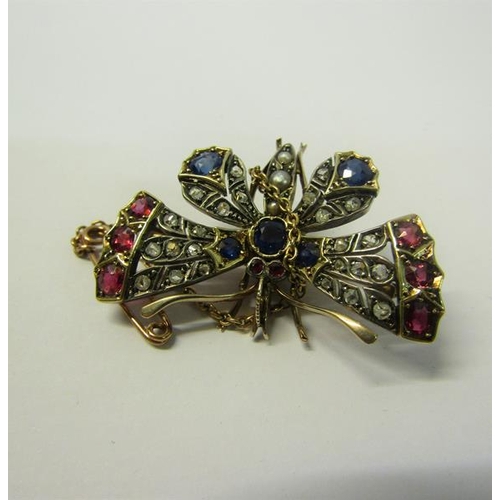 178 - A gold Butterfly brooch set with diamond, ruby, sapphire and pearls, with a safety chain.  Brooch 4.... 