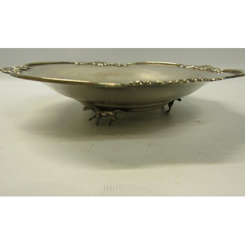 271 - Early 20c Continental silver dish with a shaped raised and shell cast upper border supported on thre... 