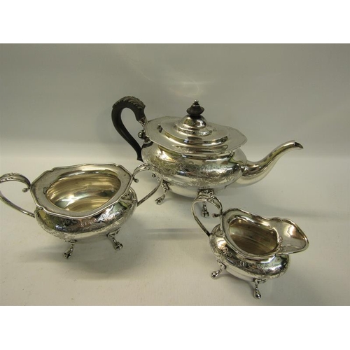 279 - A silver three piece bachelors teaset comprising teapot, sucrier and cream jug.  All of squat balust... 