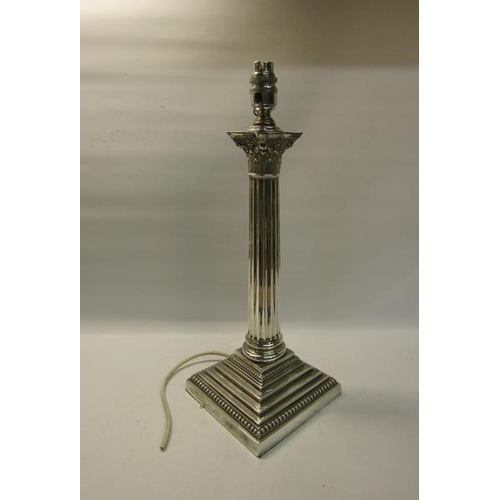 298 - An Edwardian silver Corinthian column table lamp with electrical fittings.  Makers mark for Goldsmit... 