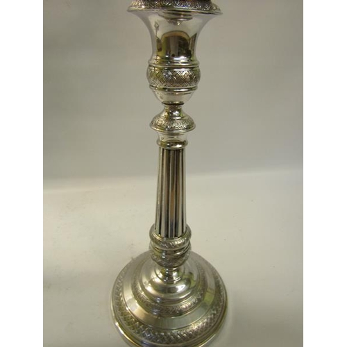 303 - A pair of 19c silver three branch candelabra's with knot fluted tapering columns and raised on stepp... 