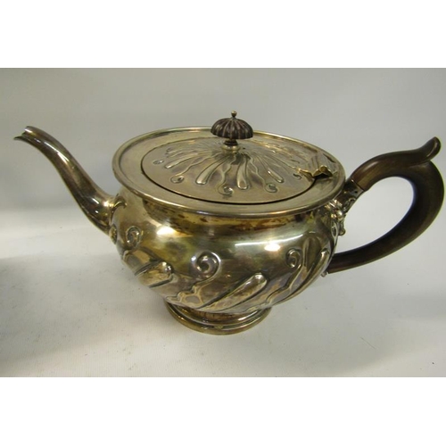 308 - A four piece silver tea and coffee service of baluster form.  The coffee and tea pot with hinged, sl... 