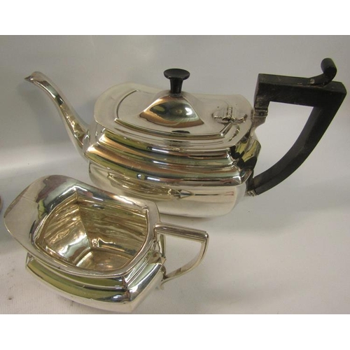 310 - A silver four piece tea and coffee service comprising tea and coffee pot together with water jug and... 