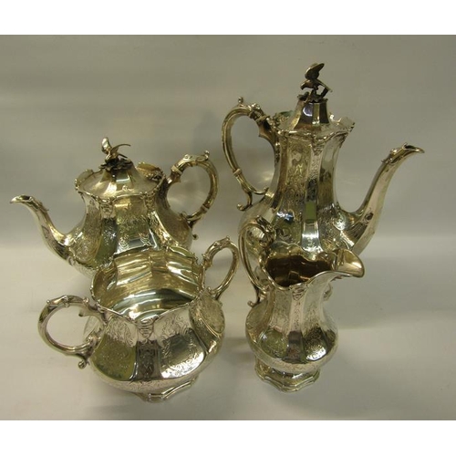 314 - A mid Victorian silver four piece tea and coffee service of chased facet baluster form, the coffee a... 