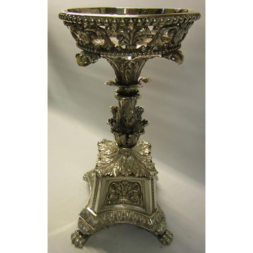 315 - A George III silver table centrepiece, the upper circular beaded and scrolling leaf pierced basket s... 