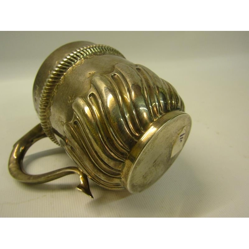 242 - A late Victorian silver tankard, half rise and lobed with an upper gadroon embossed band with scroll... 