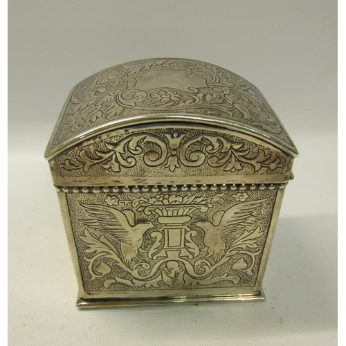 255 - A Victorian silver early Keswick School of Industrial Art tea caddy with hinged dome cover.  Embosse... 