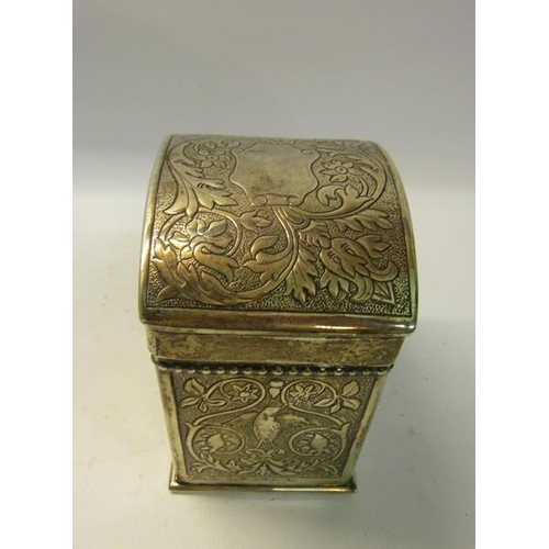 255 - A Victorian silver early Keswick School of Industrial Art tea caddy with hinged dome cover.  Embosse... 