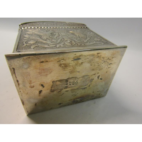 255 - A Victorian silver early Keswick School of Industrial Art tea caddy with hinged dome cover.  Embosse... 