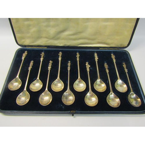 260 - A set of Twelve silver Apostle spoons with rounded bowls, plain handles with individual apostle term... 