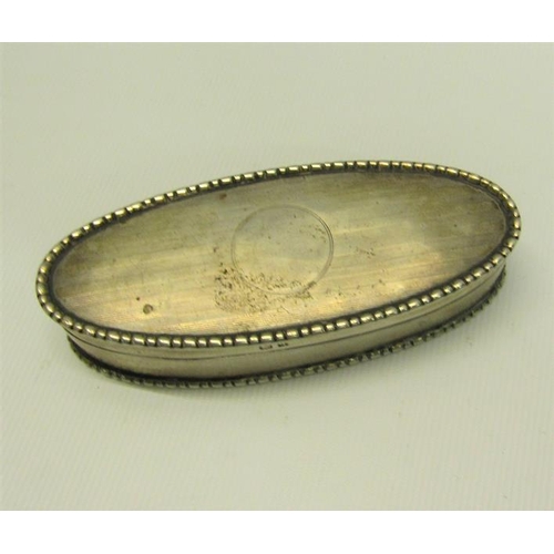 217 - An Edwardian silver toothpick box of oval form with beaded rim, engine turned and enclosed by a hing... 