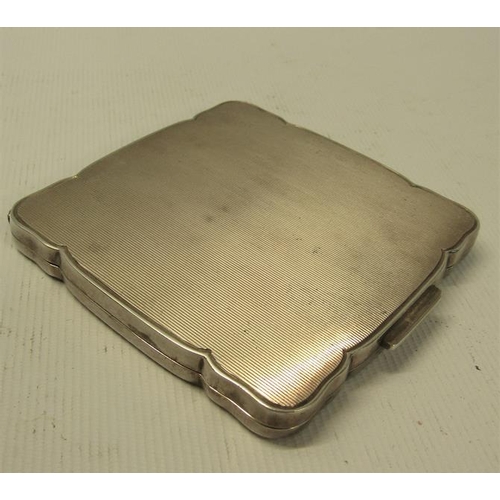 232 - An art deco period German silver compact, engine turned.  925 sterling.  7cms sq.