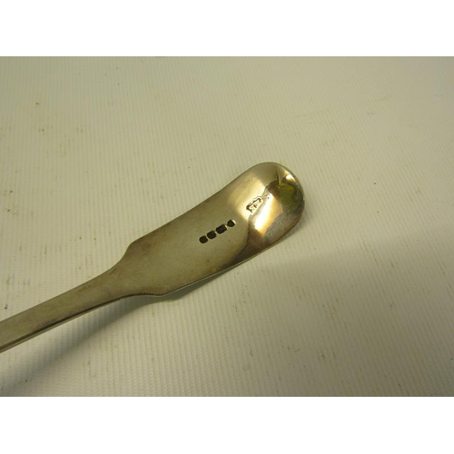 235 - A mid Victorian sifting spoon with a pierced shell shaped bowl and chased handle.  Makers mark for E... 