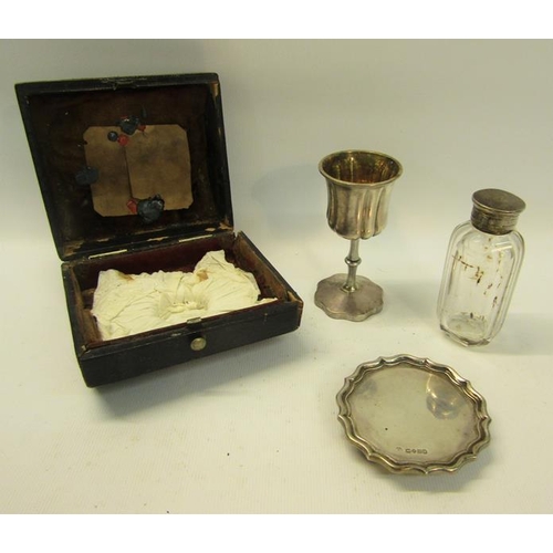 240 - A Victorian travelling communion set with communion cup.  9cms h, a paten on a circular short stand ... 