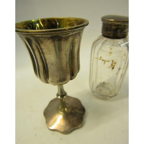 240 - A Victorian travelling communion set with communion cup.  9cms h, a paten on a circular short stand ... 