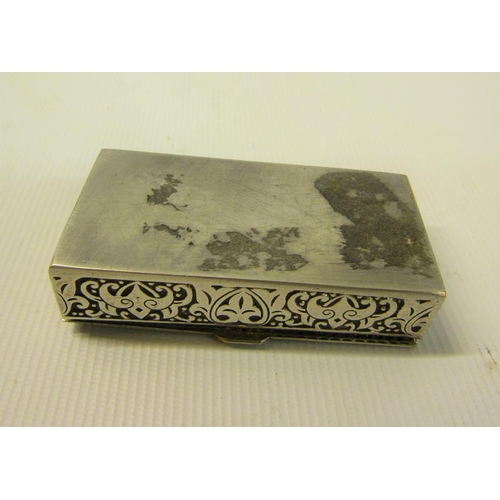 101 - A Continental silver snuff box of rectangular scroll and leaf decorated form with hinged cover.  5.5... 