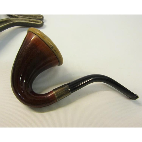 107 - An early 20c Meerschaum pipe with a sterling silver band.  In original velvet lined leather case. Th... 