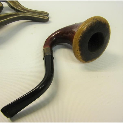 107 - An early 20c Meerschaum pipe with a sterling silver band.  In original velvet lined leather case. Th... 