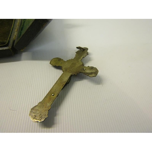 109 - A Victorian white metal crucifix shrine in an arched leather easel case.  10.5cms h.